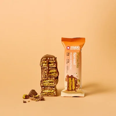 MaxiNutrition Protein Waffle Bar Pistachio Spread 39g – angeschnittener Riegel Geschmacksbild